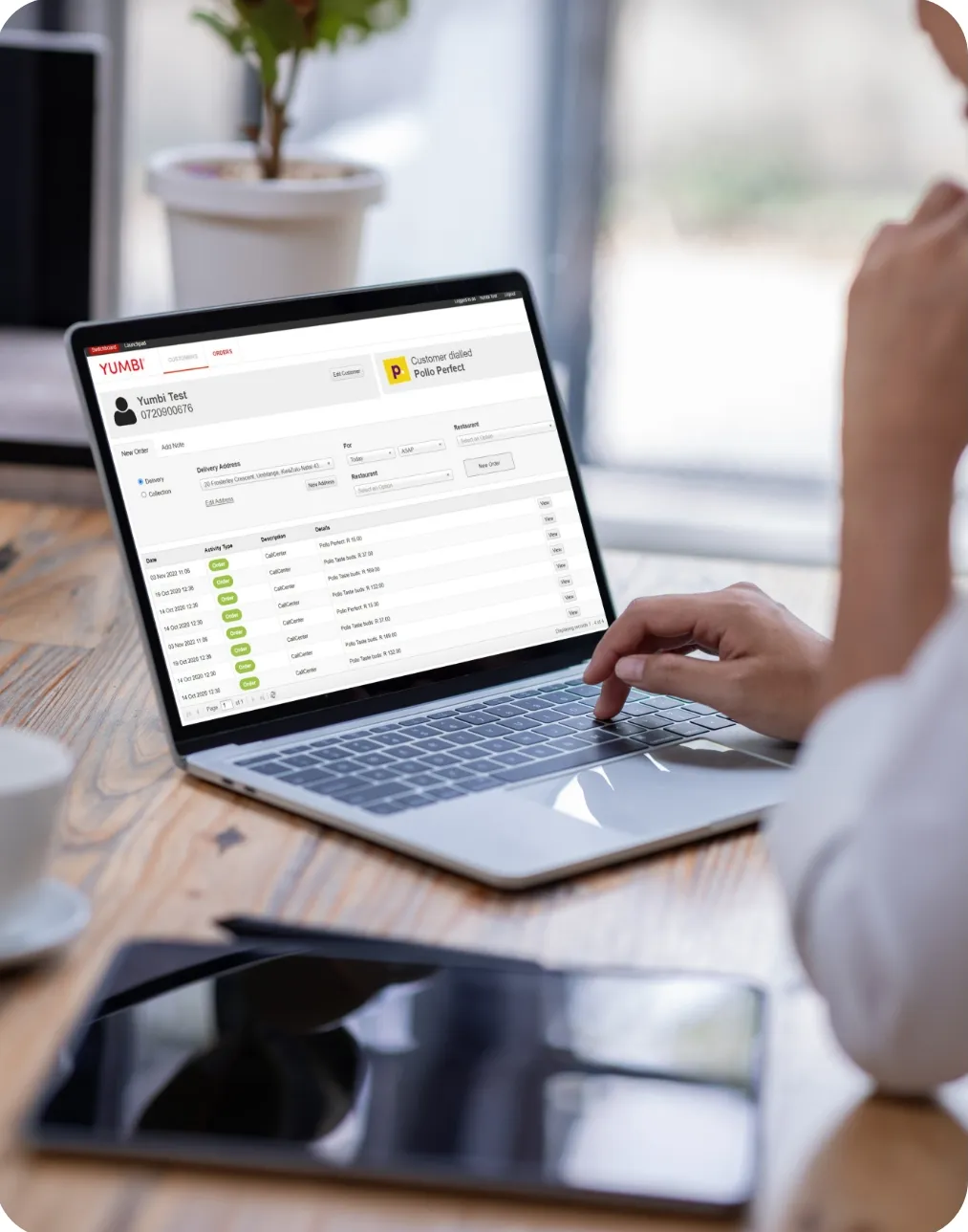 Agent working in the Switchboard call-in dashboard on a laptop